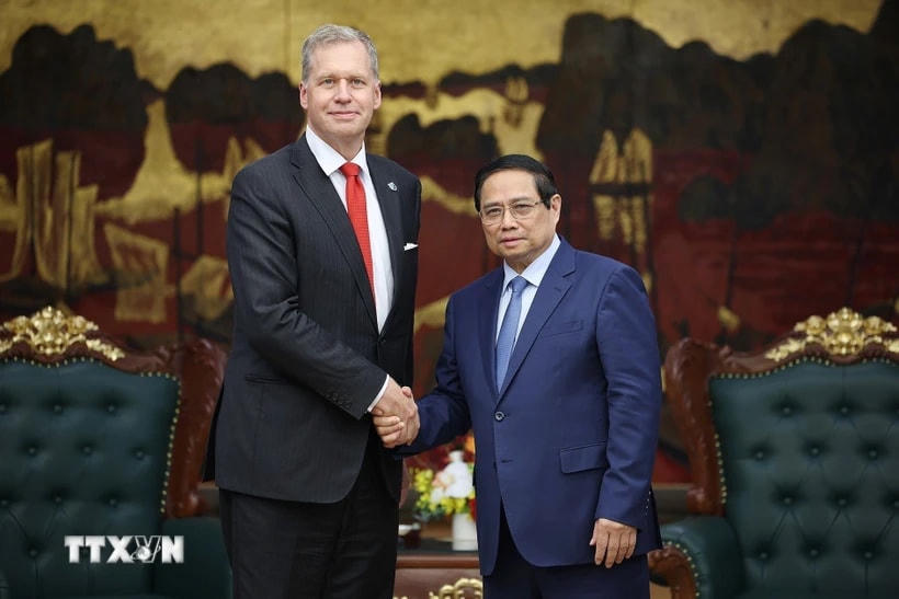 Thủ tướng Phạm Minh Chính tiếp ông Steven Kobos, Chủ tịch kiêm Giám đốc điều hành Tập đoàn Excelerate Energy (Hoa Kỳ). (Ảnh: Dương Giang/TTXVN)