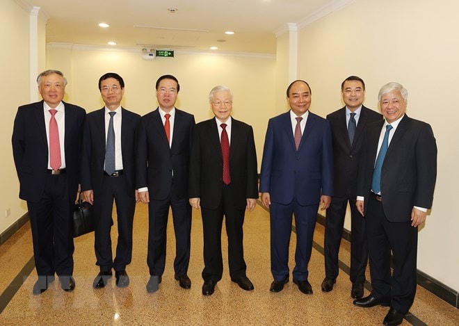 Tổng Bí thư Nguyễn Phú Trọng và các lãnh đạo Đảng, Nhà nước cùng các đại biểu dự phiên khai mạc hội nghị. (Ảnh: Trí Dũng/TTXVN).