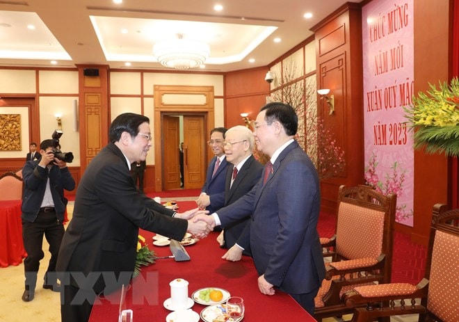 Các lãnh đạo Đảng, Nhà nước tham dự buổi chúc Tết. Ảnh: Phương Hoa/TTXVN.