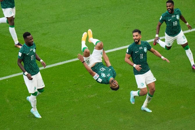 Cầu thủ Saudi Arabia ăn mừng khi hạ gục Argentina của Messi. Ảnh: Getty