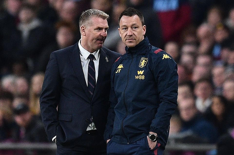 HLV Dean Smith có Craig Shakespeare và John Terry là các trợ lý. Ảnh: AFP.