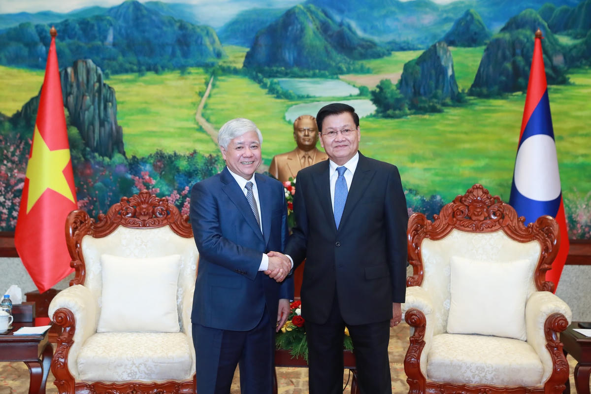 Bí thư Trung ương Đảng, Chủ tịch UBTƯ MTTQ Việt Nam Đỗ Văn Chiến và Tổng Bí thư, Chủ tịch nước CHDCND Lào Thongloun Sisoulith. Ảnh: Quang Vinh.