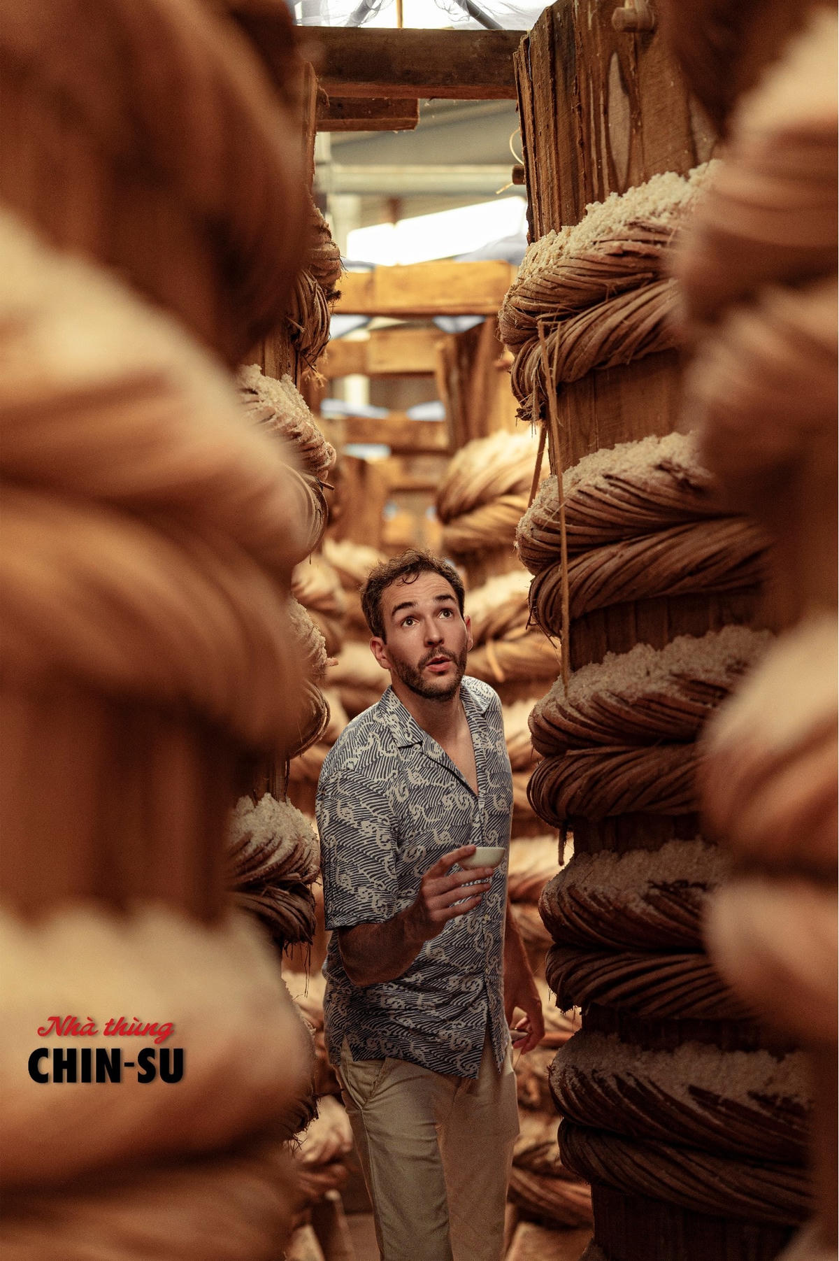 Will in Vietnam - chàng trai cao 1.9m bỗng nhiên “lọt thỏm” trong khung cảnh nhà thùng nước mắm Chin-su Phú Quốc. Mỗi thùng ủ chượp chứa 13-15 tấn cá.