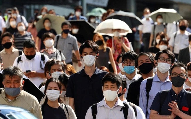 Phòng Covid-19 nhiều người chủ động đeo khẩu trang nơi công cộng. Nguồn: AFP.