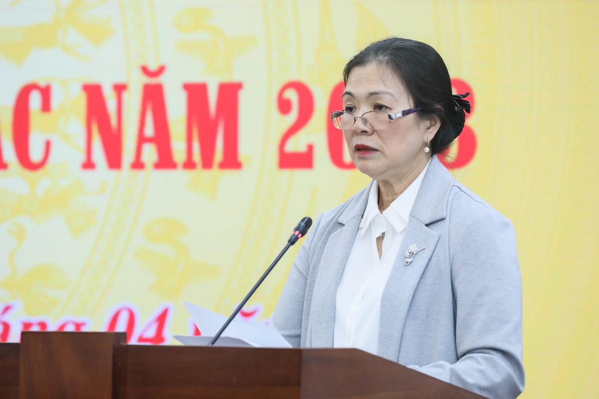 Phó Chủ tịch UBTƯ MTTQ Việt Nam Trương Thị Ngọc Ánh báo cáo kết quả phối hợp năm 2022.