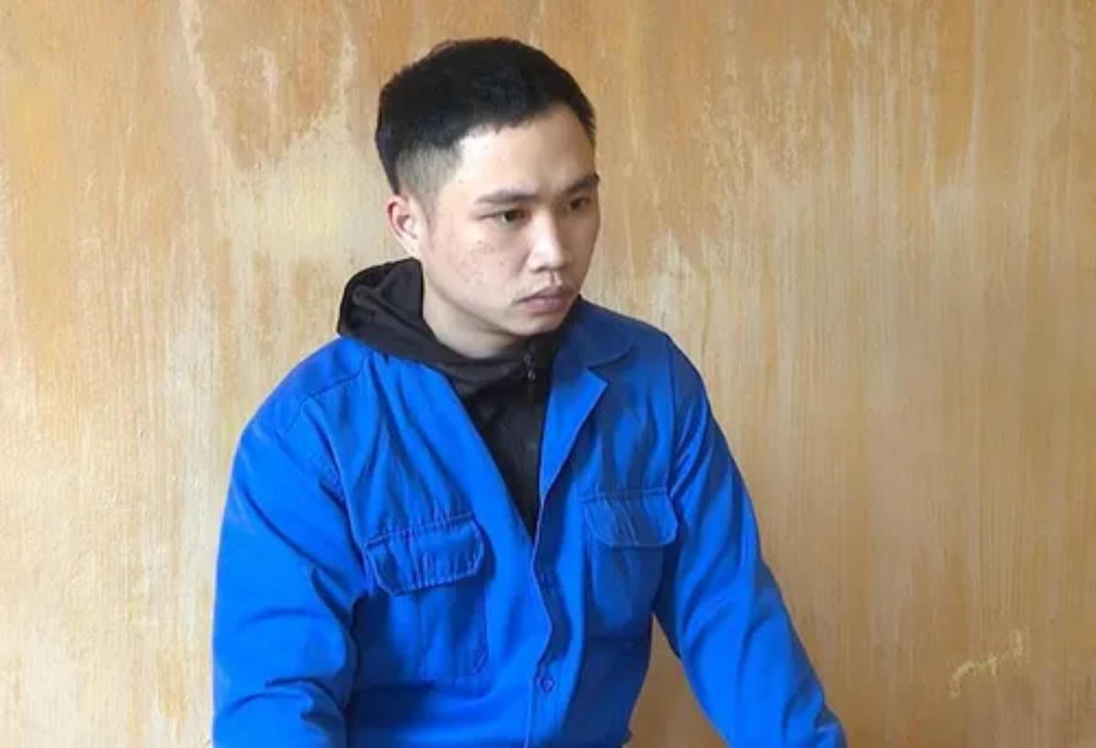 Vũ Quốc Việt tại cơ quan Công an.  