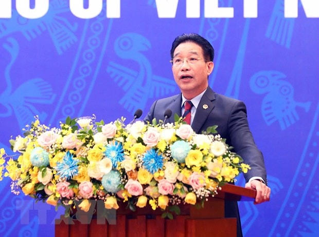 Phó Chủ nhiệm Văn phòng Chủ tịch nước Phạm Thanh Hà công bố Quyết định đặc xá năm 2022 của Chủ tịch nước Cộng hoà xã hội Chủ nghĩa Việt Nam. (Ảnh: Phạm Kiên/TTXVN).