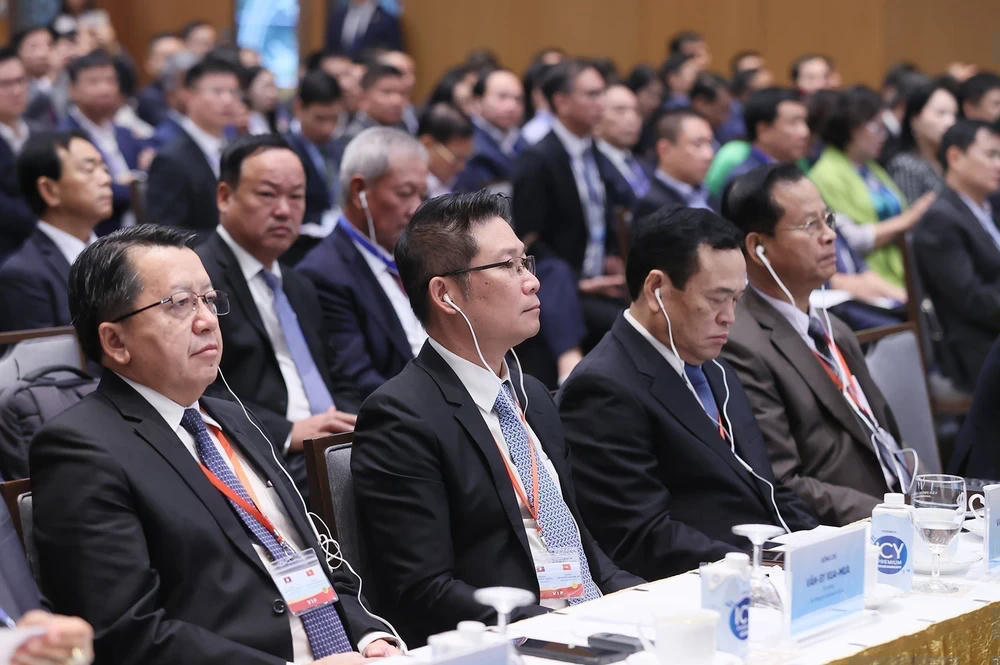 ttxvn-thu-tuong-pham-minh-chinh-va-thu-tuong-lao-sonexay-siphandone-du-hoi-nghi-hop-tac-dau-tu-viet-nam-lao-6-4193.jpg