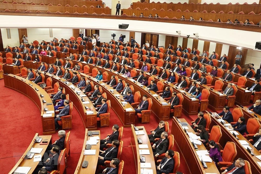 Các vị lãnh đạo Đảng, Nhà nước cùng các đại biểu dự bế mạc Hội nghị. (Ảnh: Trí Dũng/TTXVN).