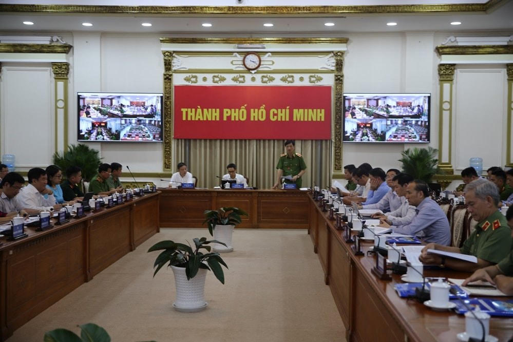 Đoàn Công tác của Chính phủ làm việc với lãnh đạo UBND TP HCM về tình hình triển khai Đề án 06. (Ảnh: Hồng Phúc)