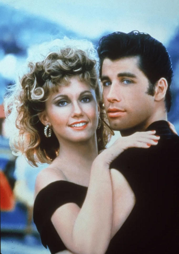 Olivia bên bạn diễn phim Grease - huyền thoại John Travolta. Ảnhh: Reuters.
