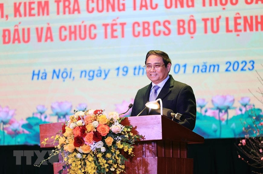 Thủ tướng Phạm Minh Chính chúc Tết cán bộ, chiến sĩ Bộ Tư lệnh Cảnh vệ. Ảnh: Dương Giang/TTXVN.
