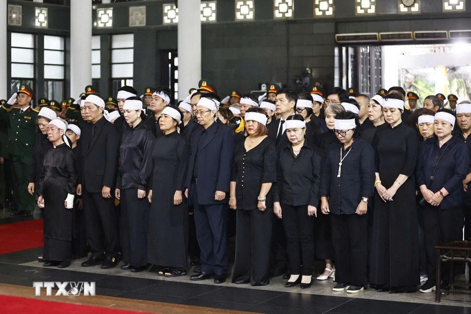 Gia quyến nguyên Chủ tịch nước Trần Đức Lương tại Lễ truy điệu. (Ảnh: TTXVN)