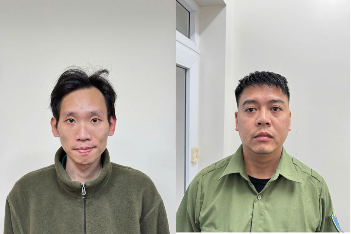 2 bảo vệ của Công ty kho vận cảng Cẩm Phả (từ trái qua phải) Nguyễn Thế Anh và Nguyễn Quốc Việt