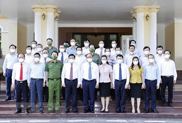 Chủ tịch nước Nguyễn Xuân Phúc với các đồng chí lãnh đạo chủ chốt tỉnh Bắc Giang tham dự buổi làm việc. (Ảnh: Thống Nhất/TTXVN).