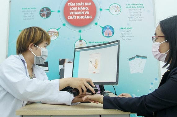 Tiếp nhận thông tin và chẩn đoán bệnh tại Bệnh viện Miền Đông, quận 9, TP HCM. Ảnh SGGP.