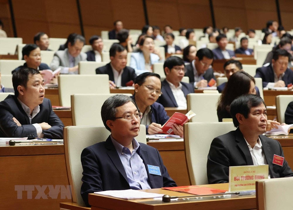 Các đại biểu dự Hội nghị tại điểm cầu chính - Phòng họp Diên Hồng, Nhà Quốc hội (Hà Nội), sáng 28/3/2021. (Ảnh: Thống Nhất/TTXVN).