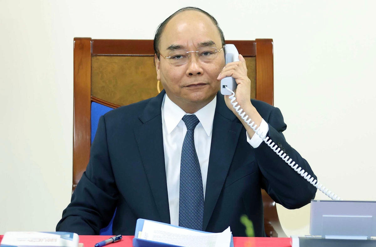 Thủ tướng Nguyễn Xuân Phúc điện đàm với Thủ tướng Đức Angela Merkel. Ảnh: VGP.