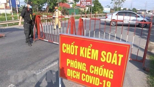 Một chốt kiểm dịch Covid-19. Ảnh minh họa: Đinh Văn Nhiều/TTXVN.  