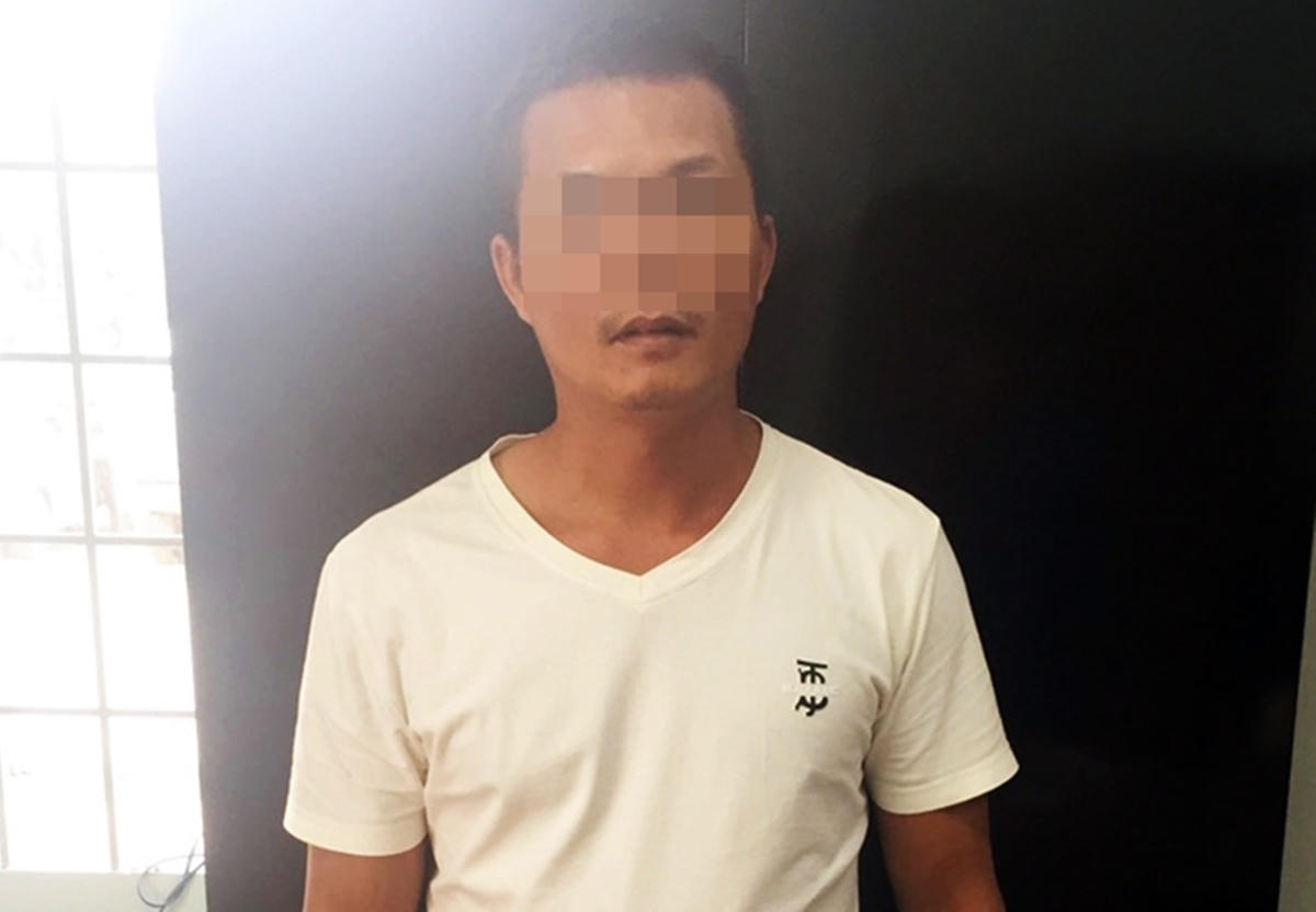 Nghi phạm Võ Quang L. tại cơ quan điều tra.