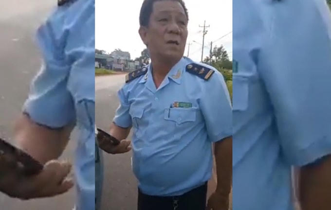 Ông Vệ lúc bị người dân chặn lại. Ảnh cắt từ video.
