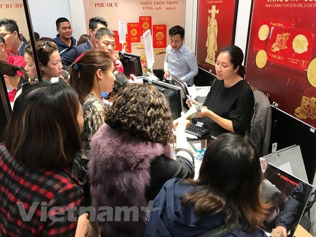 Giao dịch vàng tại doanh nghiệp. (Ảnh: PV/Vietnam+).