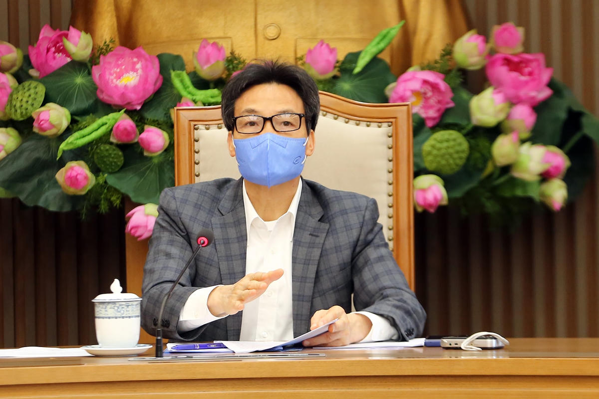 Phó Thủ tướng Vũ Đức Đam chủ trì cuộc họp Thường trực Ban Chỉ đạo quốc gia phòng chống dịch bệnh Covid-19, chiều 5/2. Ảnh: VGP/Đình Nam.