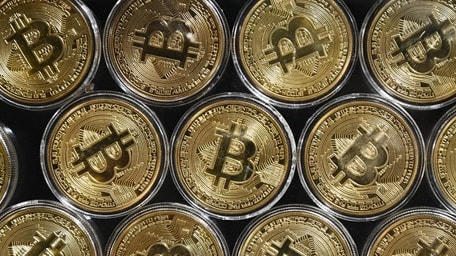 Đồng tiền kỹ thuật số Bitcoin. (Ảnh: AFP/TTXVN).