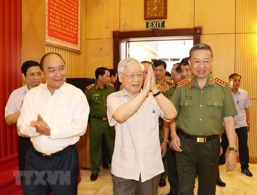 Tổng Bí thư, Chủ tịch nước Nguyễn Phú Trọng, Thủ tướng Chính phủ Nguyễn Xuân Phúc đến dự Hội nghị. (Ảnh: Trí Dũng/TTXVN).