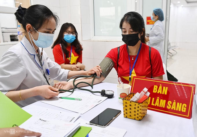 Tình nguyện viên tiêm thử vaccine Nano Covax, tháng 2/2021. Ảnh: Vnexpress.