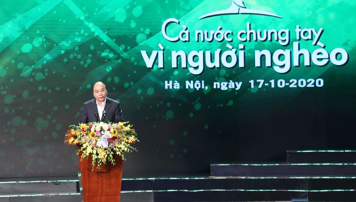 Thủ tướng Chính phủ Nguyễn Xuân Phúc phát biểu tại Chương trình "Cả nước chung tay Vì người nghèo" năm 2020. Ảnh: Quang Vinh.