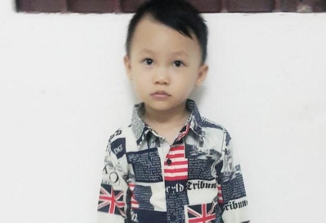 Chân dung bé Bin bị mất tích.
