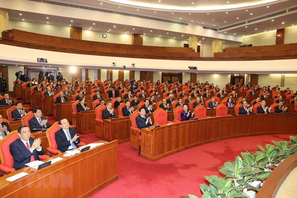 Các đồng chí lãnh đạo Đảng, Nhà nước và các đại biểu dự bế mạc Hội nghị Trung ương lần thứ 15. (Ảnh: Trí Dũng/TTXVN).