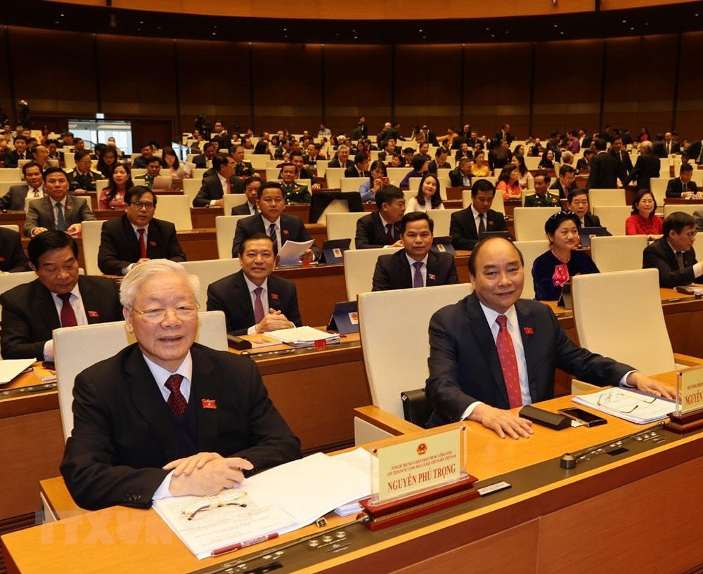 Tổng Bí thư, Chủ tịch nước Nguyễn Phú Trọng và Thủ tướng Nguyễn Xuân Phúc dự khai mạc Kỳ họp thứ 11, Quốc hội khóa XIV. (Ảnh: Trí Dũng/TTXVN).