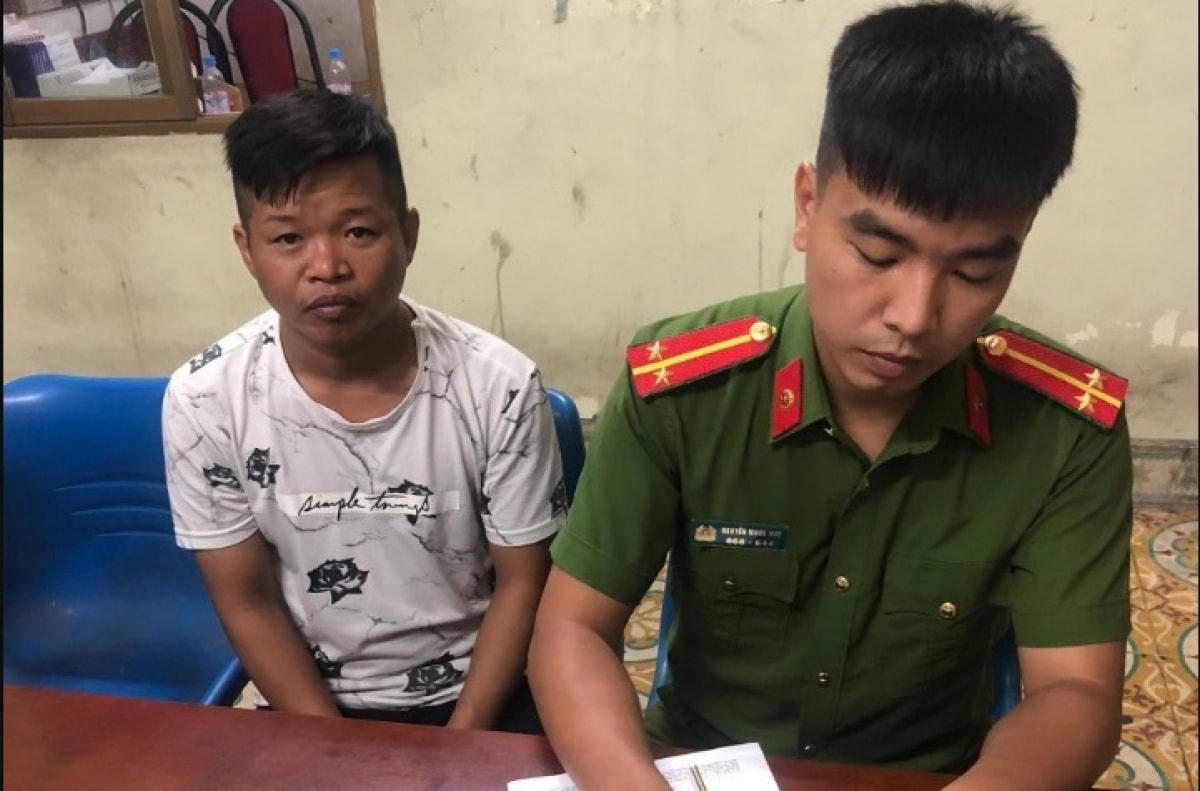 Đối tượng Trần Văn Học tại trụ sở Công an.