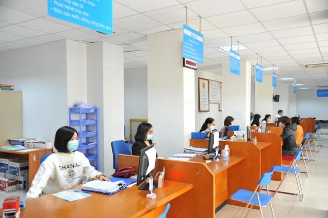 Cán bộ nhân viên cục Thuế Hà Nội đều thực hiện nghiêm túc việc đeo khẩu trang để phòng dịch.