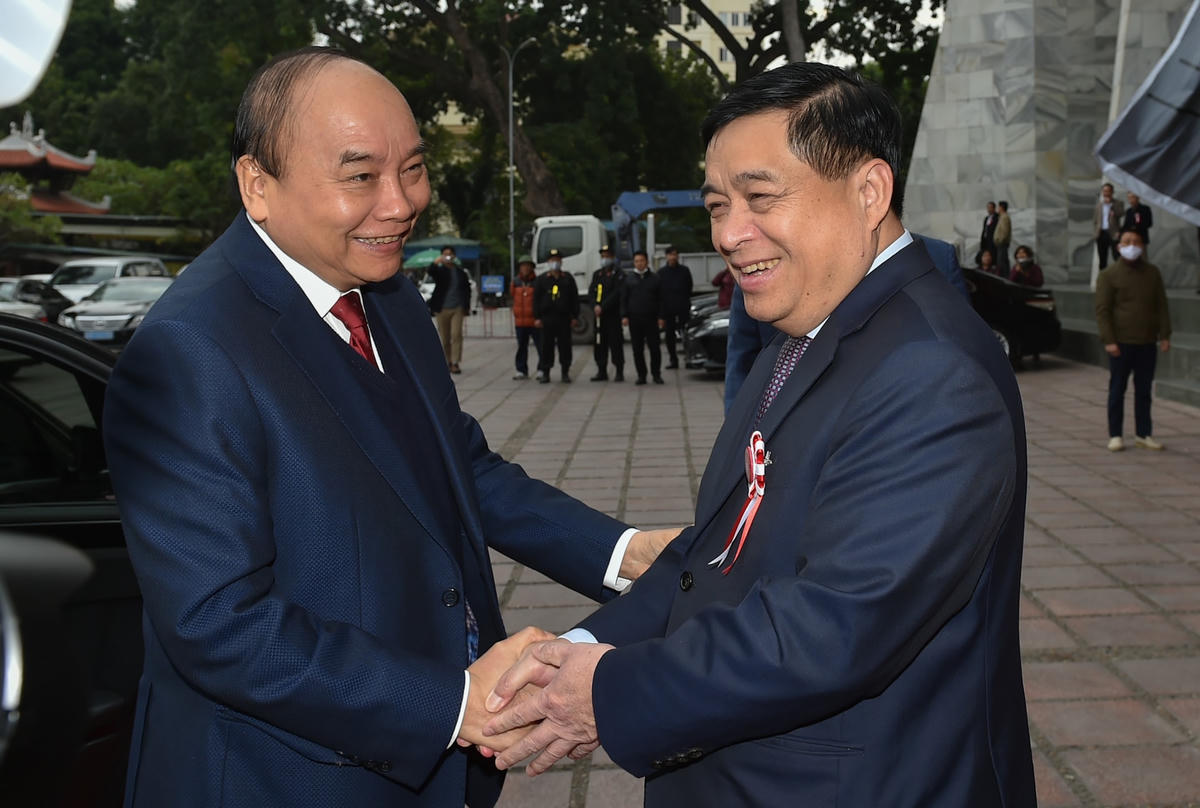 Thủ tướng Nguyễn Xuân Phúc và Bộ trưởng Bộ Kế hoạch và Đầu tư Nguyễn Chí Dũng. Ảnh: VGP/Quang Hiếu.  