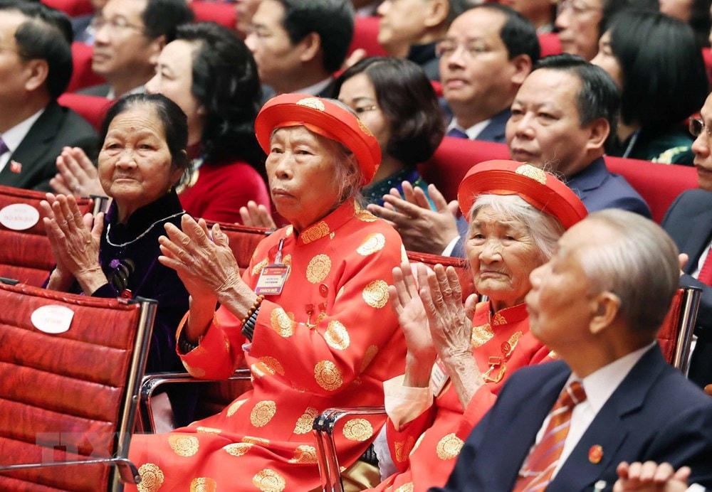 Các Mẹ Việt Nam Anh hùng là đại biểu khách mời dự phiên khai mạc Đại hội. Ảnh: TTXVN.  