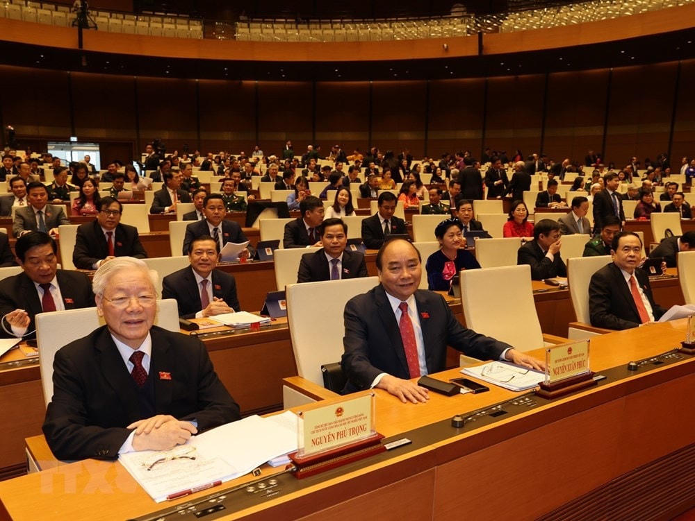 Tổng Bí thư, Chủ tịch nước Nguyễn Phú Trọng và Thủ tướng Nguyễn Xuân Phúc dự khai mạc Kỳ họp thứ 11, Quốc hội khóa XIV. (Ảnh: Trí Dũng/TTXVN).