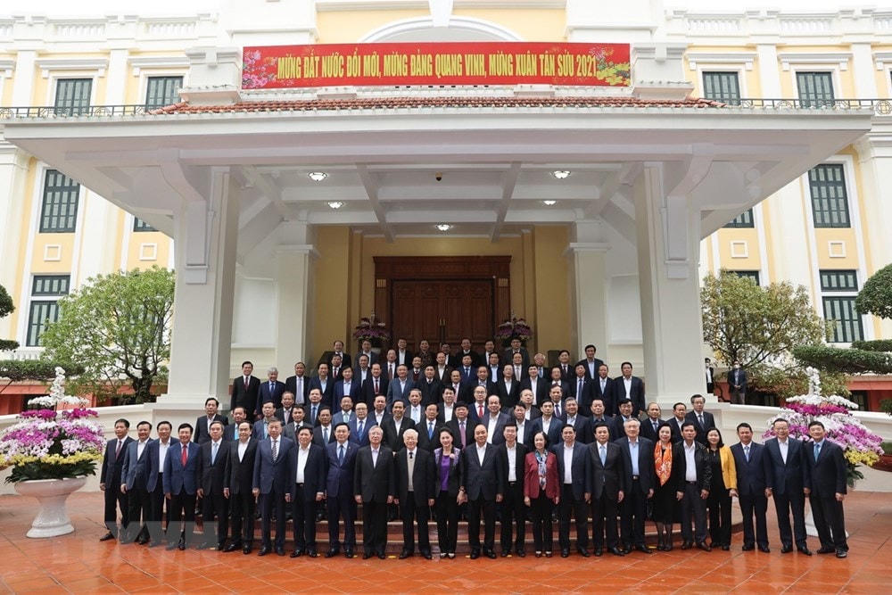 Tổng Bí thư, Chủ tịch nước Nguyễn Phú Trọng, Thủ tướng Nguyễn Xuân Phúc và Thường trực Ban Bí thư Võ Văn Thưởng cùng các đồng chí lãnh đạo nguyên lãnh đạo Đảng, Nhà nước tại buổi gặp mặt. Ảnh: Trí Dũng/TTXVN.