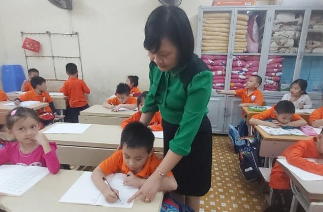 Cô Nguyễn Thị Thủy nhận xét, chương trình mới giúp học sinh tránh đọc vẹt.  