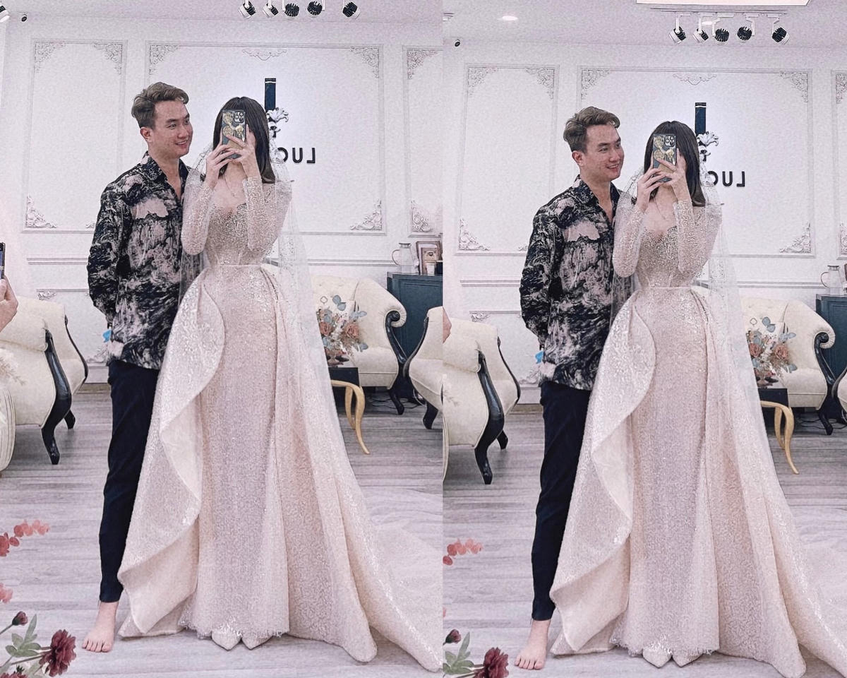 Anh Tuấn dẫn bạn gái kém 11 tuổi đi thử váy cưới trong ngày lễ tình nhân. 