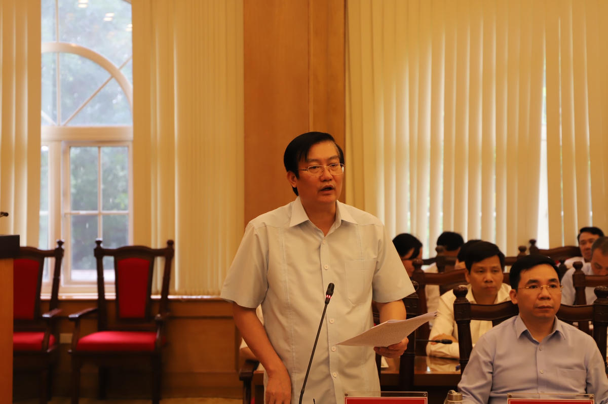 Chủ tịch Ủy ban MTTQ tỉnh Vĩnh Phúc Nguyễn Tuấn Khanh báo cáo tại cuộc làm việc.