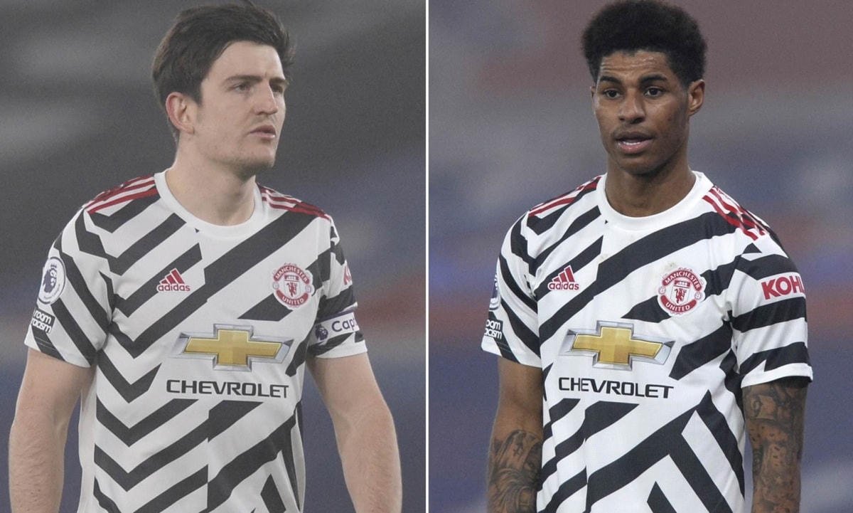 Harry Maguire và Marcus Rashford cãi vã ngay trên sân. Ảnh: Daily Mail.  