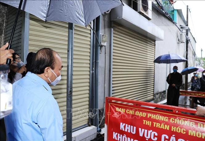 [ẢNH] Chủ tịch nước, Chủ tịch UBTƯ MTTQ Việt Nam kiểm tra công tác phòng, chống dịch tại TP HCM