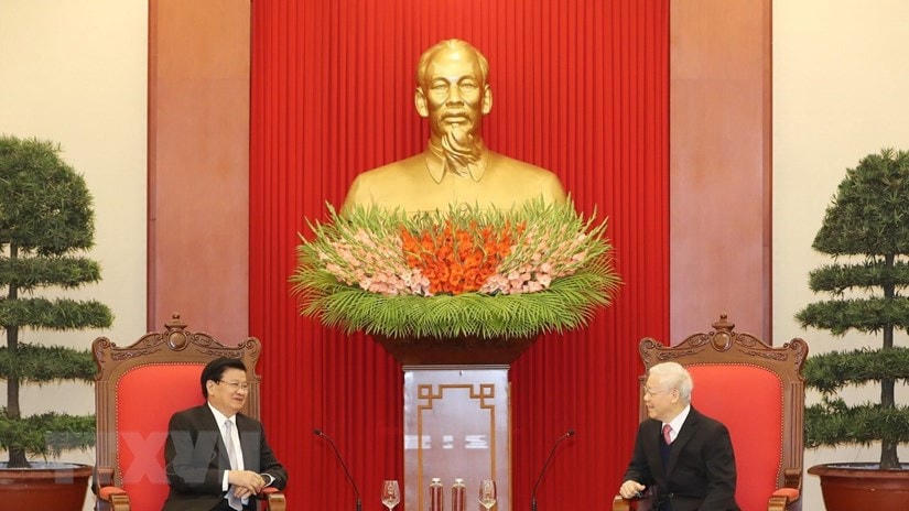 Tổng Bí thư Nguyễn Phú Trọng tiếp Thủ tướng Lào Thongloun Sisoulith, hồi tháng 12/2020. (Ảnh: Trí Dũng/TTXVN).