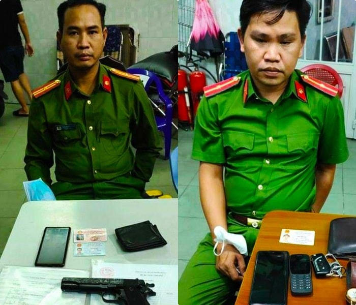 Đối tượng Trần Văn Sơn (trái) và Trần Hồng Thái bị bắt cùng trang phục Công an nhân dân.