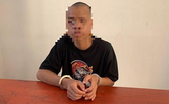 Đối tượng Vương tại cơ quan chức năng.