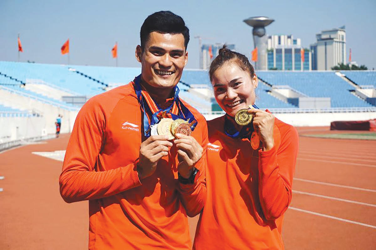 Hai anh em vận động viên Quách Công Lịch và Quách Thị Lan.
