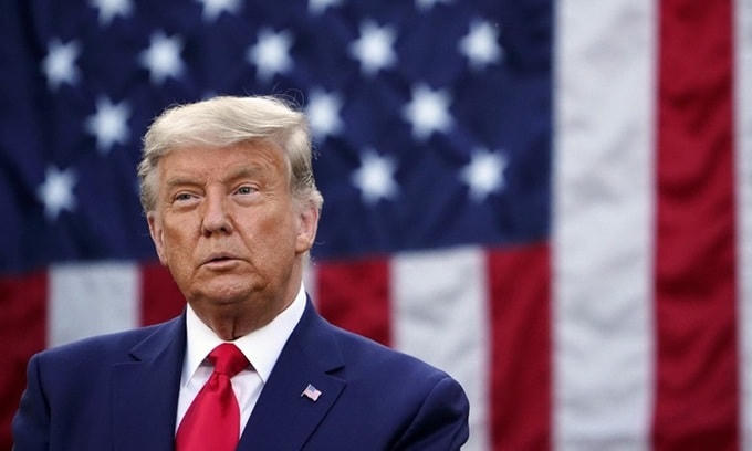 Tổng thống Mỹ Donald Trump với mái tóc xám trắng tại cuộc họp báo ở Nhà Trắng hôm 13/11. Ảnh: AFP.  